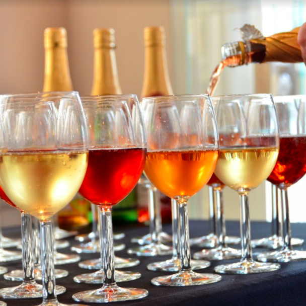 a glass filled with wine glasses